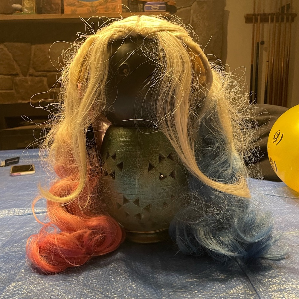 One size fits most Blue/Pink pigtail wig. Never worn no tags bought on Amazon